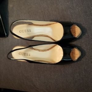 Guess women's 9 1/2 black patent leather and cork heel.